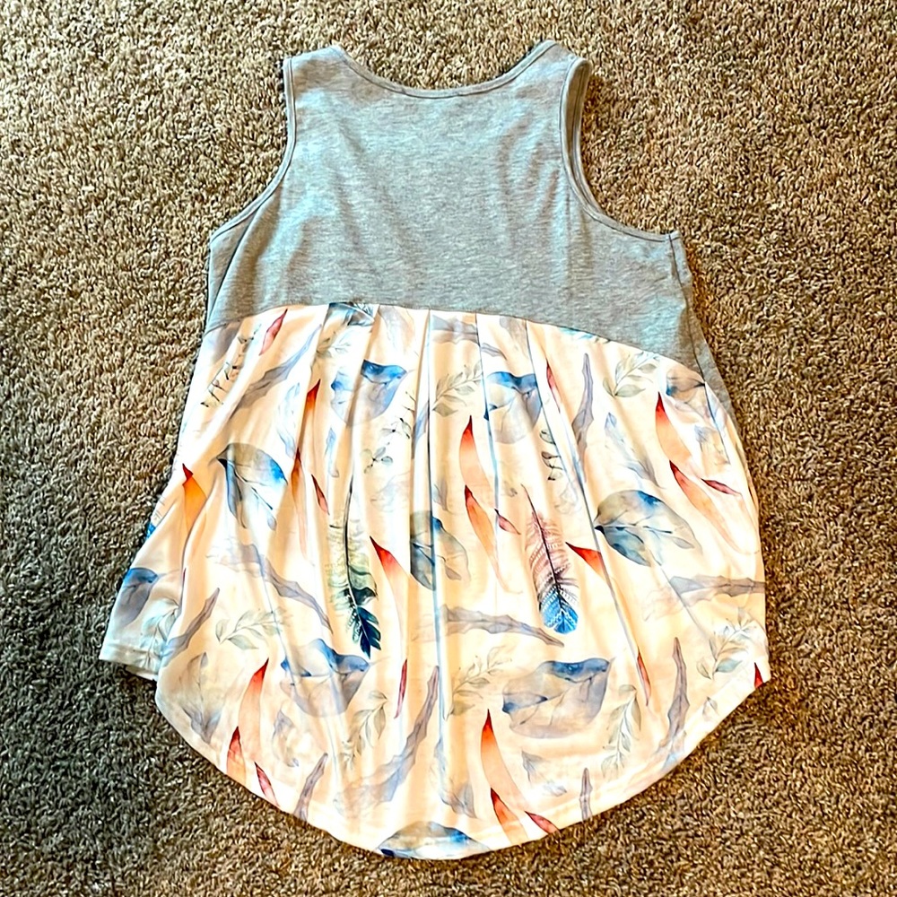 Feathered tank top. Never worn only washed.  Medium